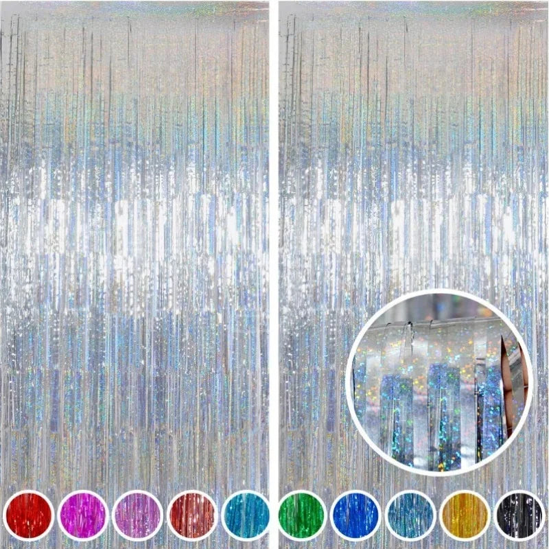 Metallic foil tinsel fringe backdrop set with various iridescent and colored strands.