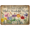 Vintage metal tin sign featuring a floral illustration with the text I see trees of green red roses too I see them bloom for 