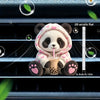 A cute panda bear plush toy holding a pink straw in a car vent clip decor