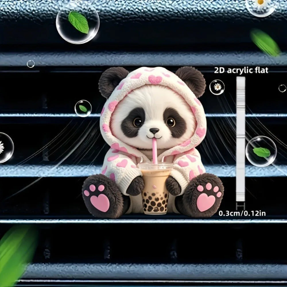 A cute panda bear plush toy holding a pink straw in a car vent clip decor