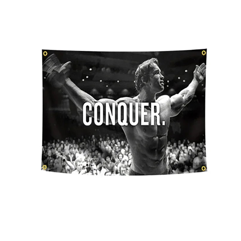 A black banner featuring a muscular man with his arms raised, overlaid with the text CONQUER.
