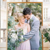 A portrait of a couple embracing, captured in a framed photo print.
