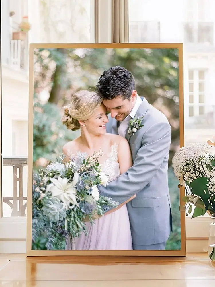 A portrait of a couple embracing, captured in a framed photo print.