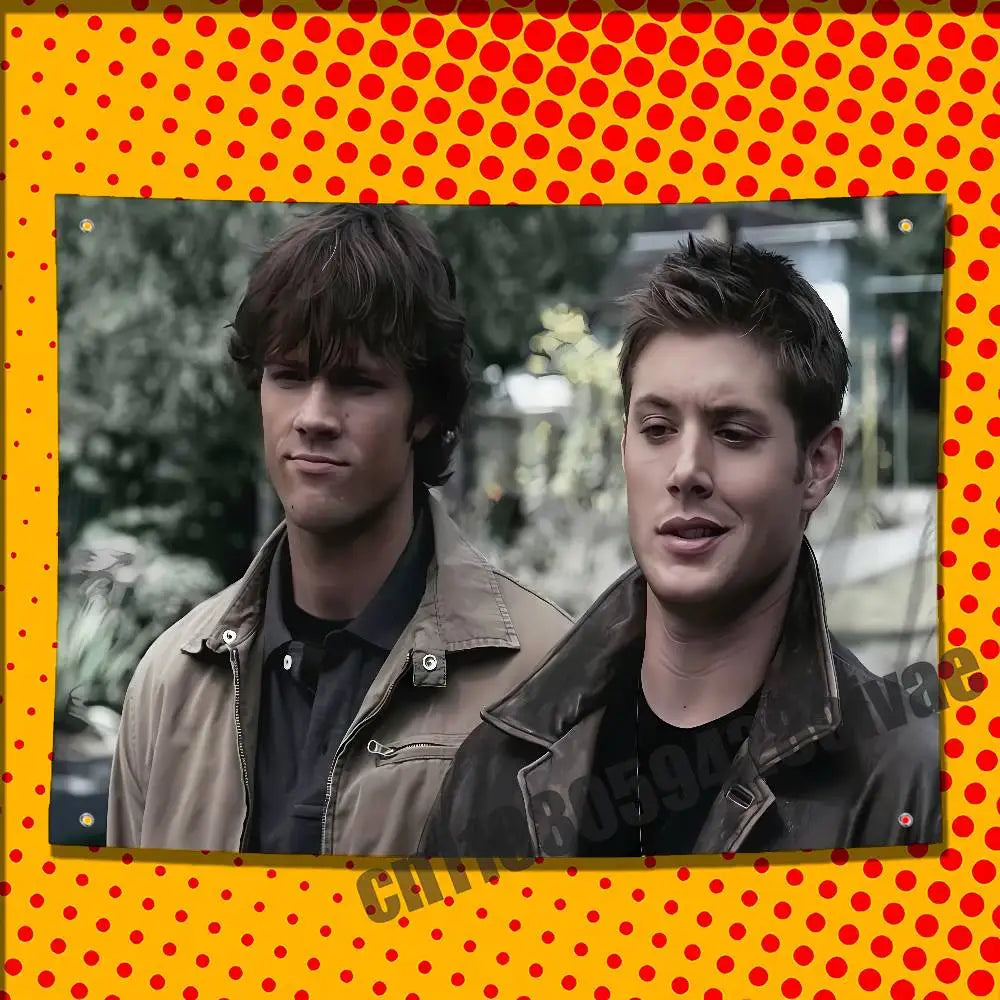 Two young men in leather jackets posing for a photo against a blurred outdoor background.
