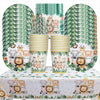 A set of safari jungle themed tableware including cups and plates with animal illustrations.