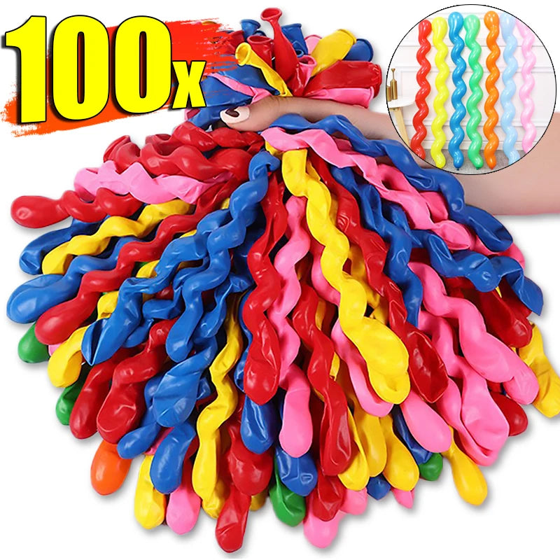 A large collection of colorful spiral twist latex balloons in various bright colors, including red, yellow, blue, and pink.