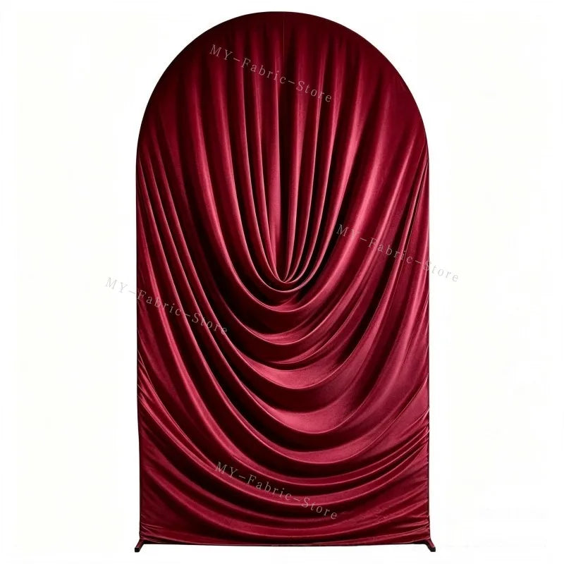 A deep red velvet drape or arch cover used for weddings and events.