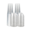 A set of clear disposable plastic cups with lids stacked in a row.