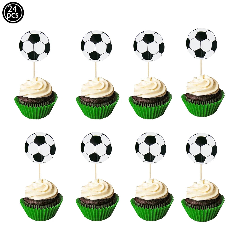 A set of 24 soccer ball cake toppers featuring black and white balls on green cupcake liners.