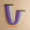 Boho macrame wall tapestry featuring vertical strands of purple and white cord