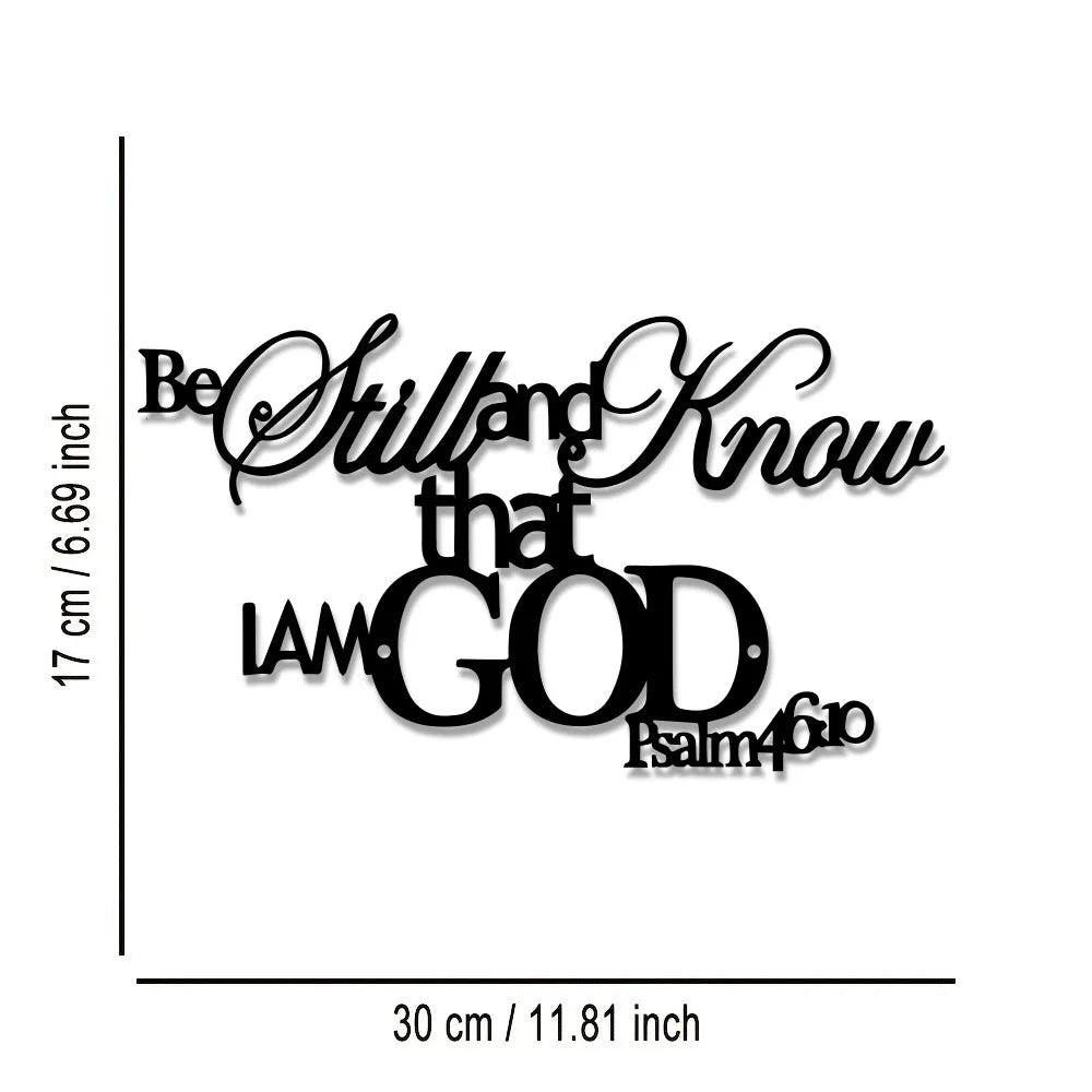 Black metal sign with script text Be Still and Know that I am God and Psalm 46:10