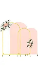 A set of vintage bud glass vases displayed on a gold stand with floral accents.