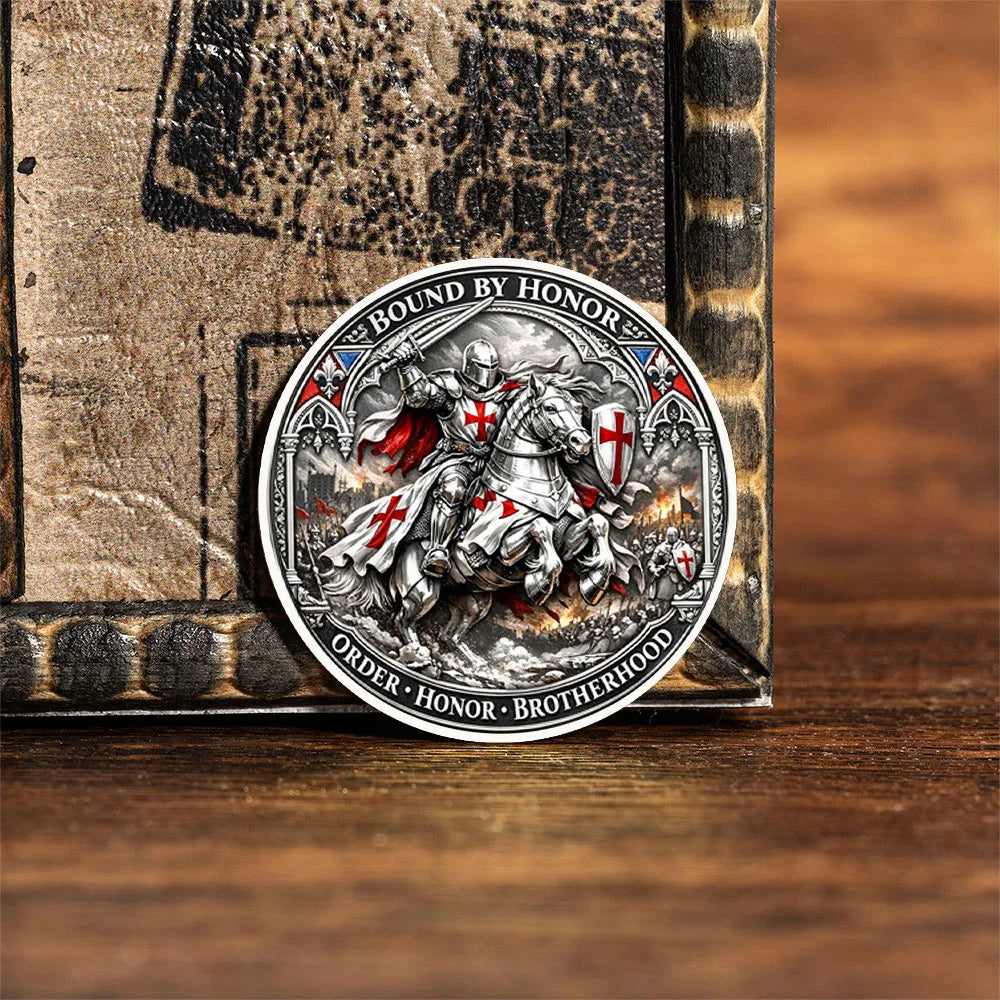 A silver-plated commemorative coin featuring a knight in armor and a brotherhood emblem, set against a dark background.
