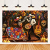 A vibrant Day of the Dead fiesta photo backdrop featuring a colorful floral skull design with skeletons and glowing candles.
