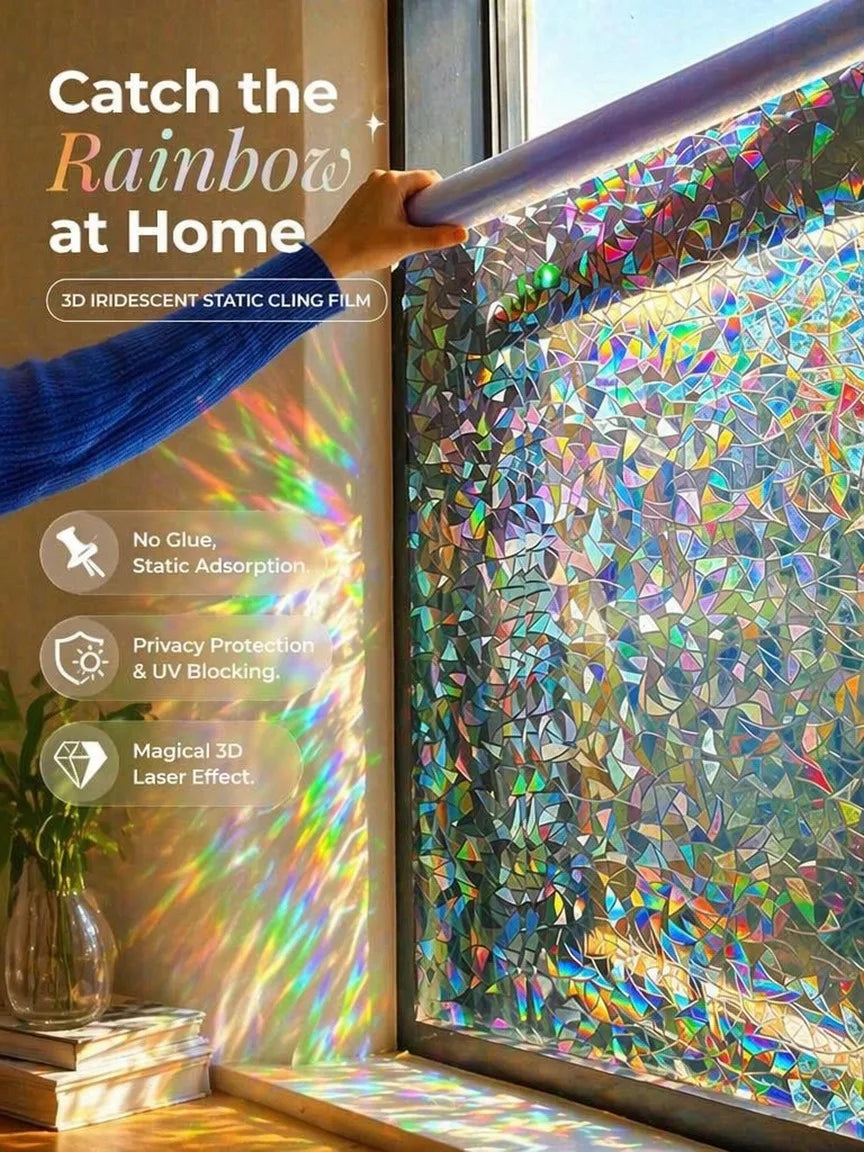 Hand applying a 3D iridescent static cling film to a window, showing a colorful, holographic effect.