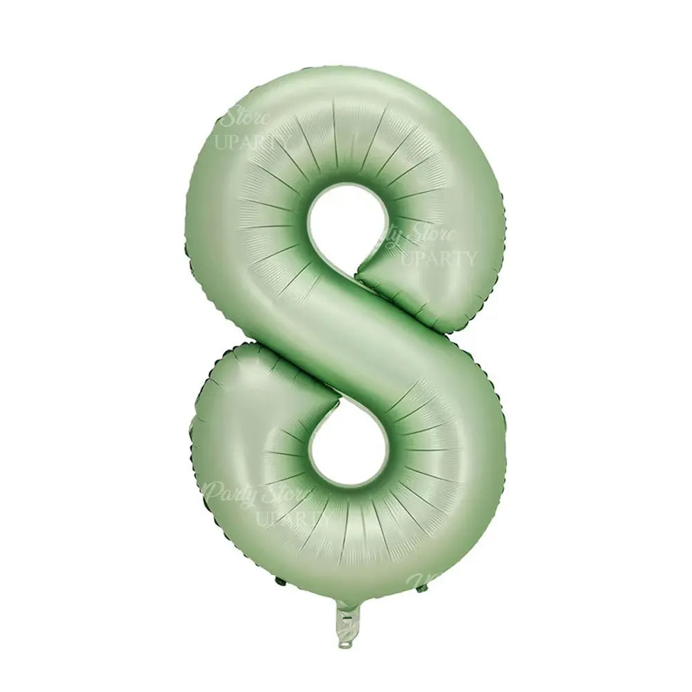 A large, light green foil balloon shaped like the number eight.