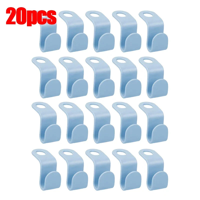 A set of 30 light blue space-saving hanger connector hooks for organizing items.