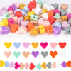 A collection of colorful silicone heart beads in various shades and shapes for DIY jewelry making
