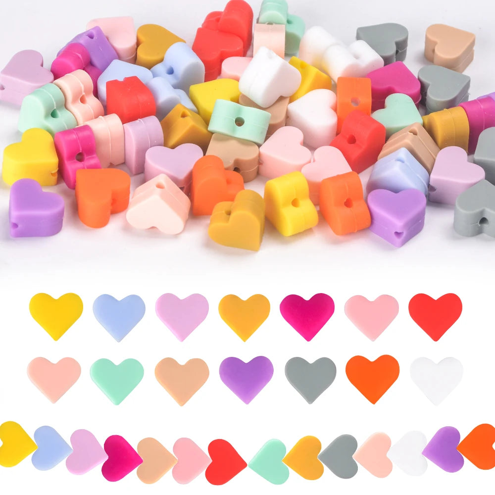 A collection of colorful silicone heart beads in various shades and shapes for DIY jewelry making