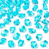 A pile of bright blue decorative crushed diamond acrylic pebbles.