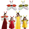 A set of insect wing and headband costume featuring red and black wings on a dark dress and yellow dress.