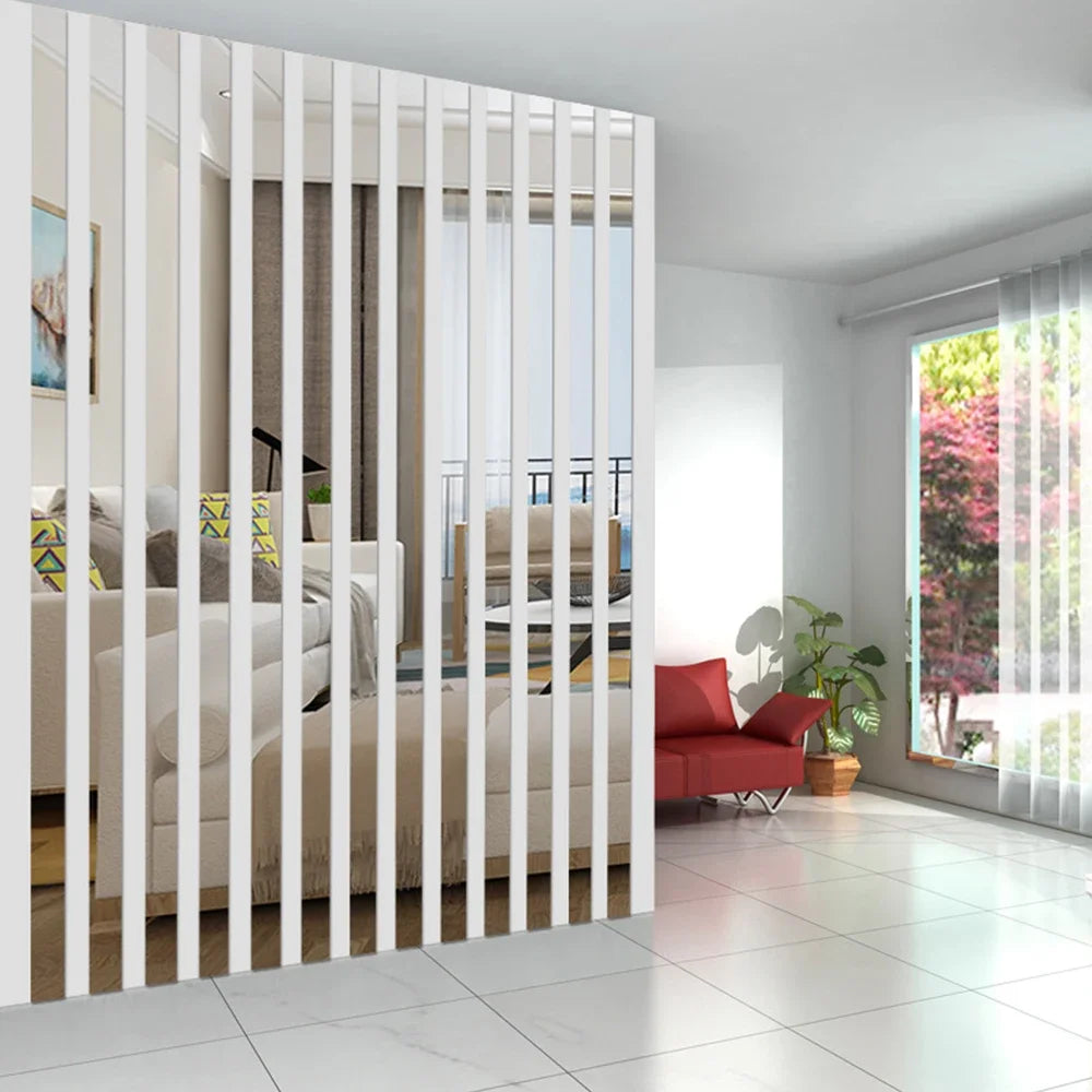 Acrylic mirror strip wall stickers in white framing are installed on a wall, creating vertical slats for modern home decor.
