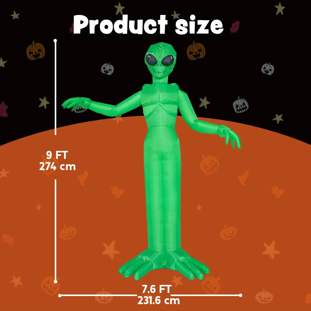 A green alien inflatable decoration standing upright against an orange background with size measurements.