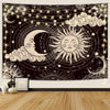 A dark tapestry wall hanging featuring a celestial design with a crescent moon, sun, and stars against a starry background.