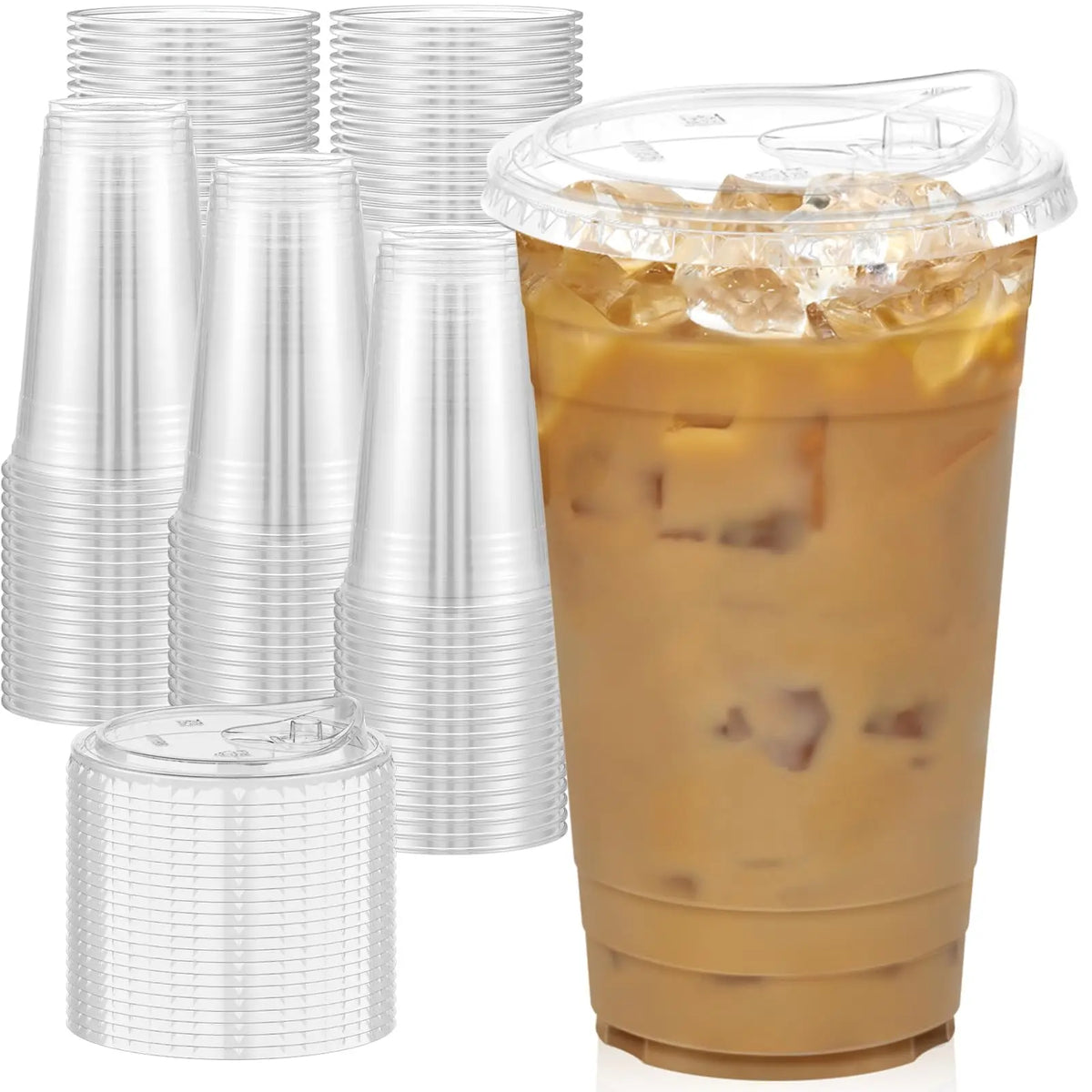 A clear plastic cup filled with iced coffee or smoothie, surrounded by stacks of matching disposable cups and lids.