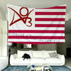 A red and white striped decorative fabric banner is displayed indoors above a white sofa.