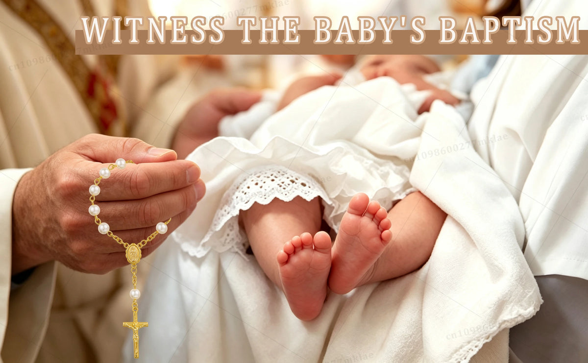 Hands holding a baby wrapped in white cloth during a baptism ceremony, with a gold cross rosary visible.