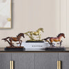 A bronze sculpture of a rustic western horse standing on a white base.