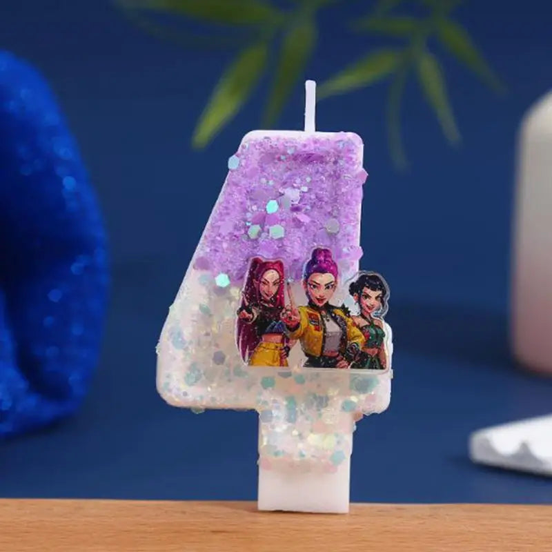 A white candle shaped like the number 4, decorated with purple glitter and figures of characters.
