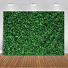 A dense green tropical palm leaf backdrop used for party decor and photography.