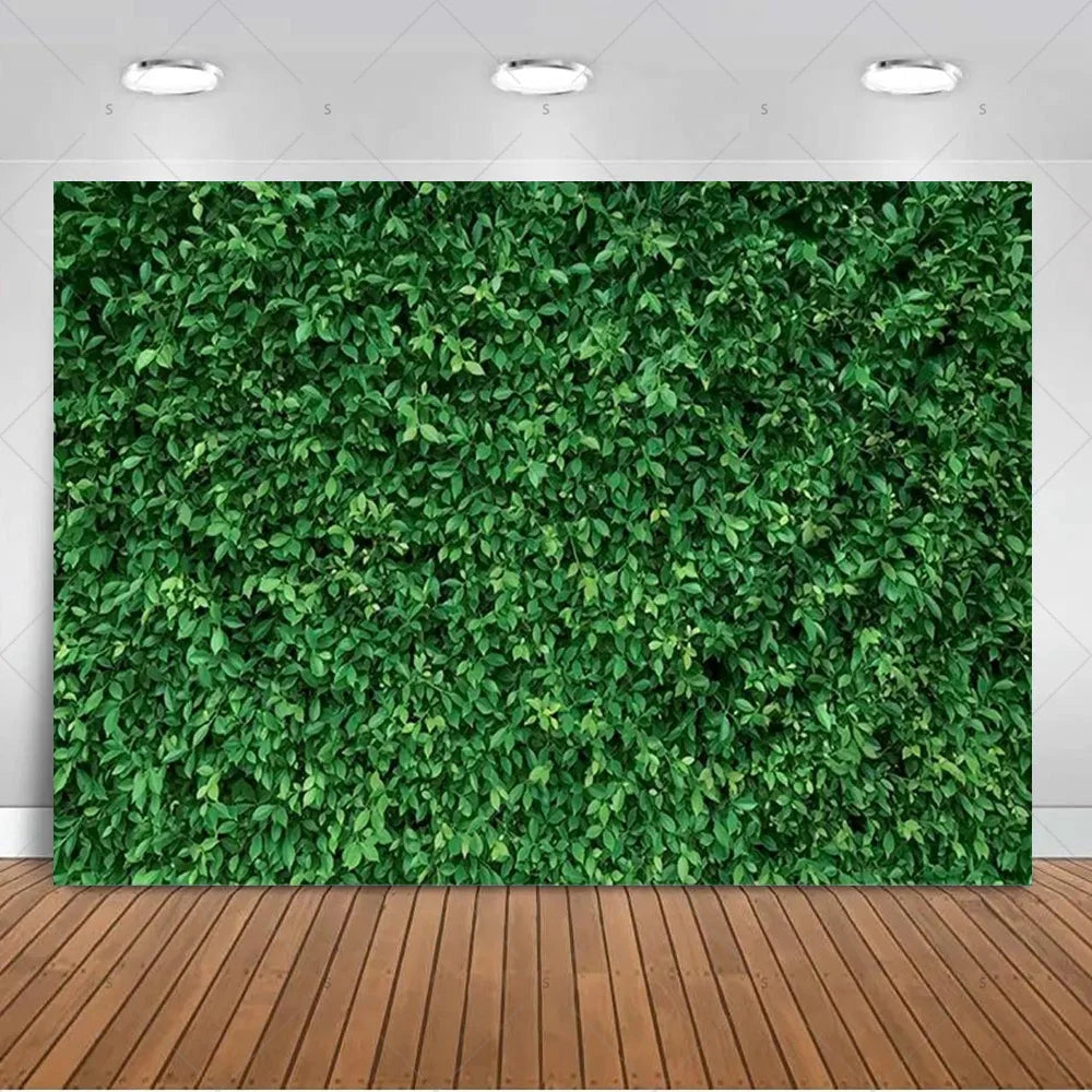 A dense green tropical palm leaf backdrop used for party decor and photography.
