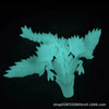 A light cyan 3D printed articulated dragon fidget figurine displayed against a black background.