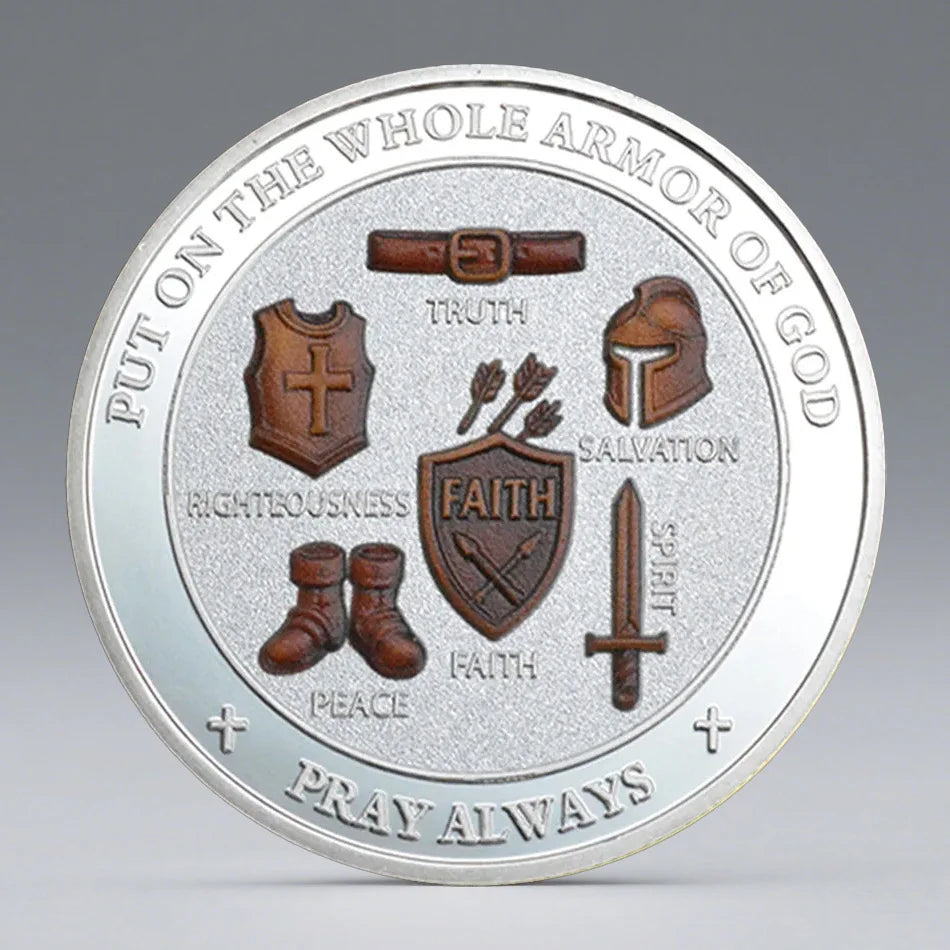 A silver coin featuring various virtues like Truth, Salvation, Faith, Peace, and a sword, with the text Pray Always.