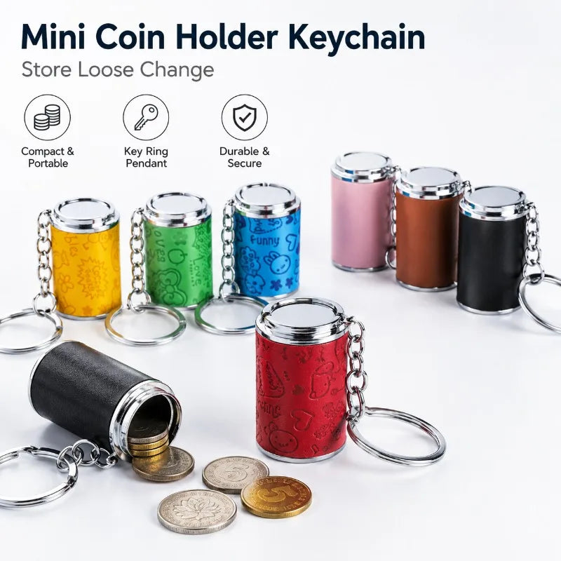 A collection of mini coin holder keychains in various colors and finishes, including metal and plastic versions.