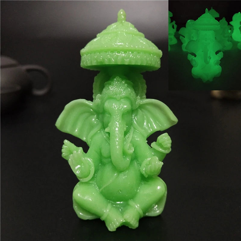 A vibrant green bronze Ganesha Buddha statue for home decor, sculpted in a seated pose.