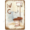 A vintage tin sign featuring the letters WC and an illustration of a restroom sink and toilet.
