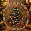 DIY Christmas tree suncatcher made of glitter, pearls, and jewels hanging by a metal chain.