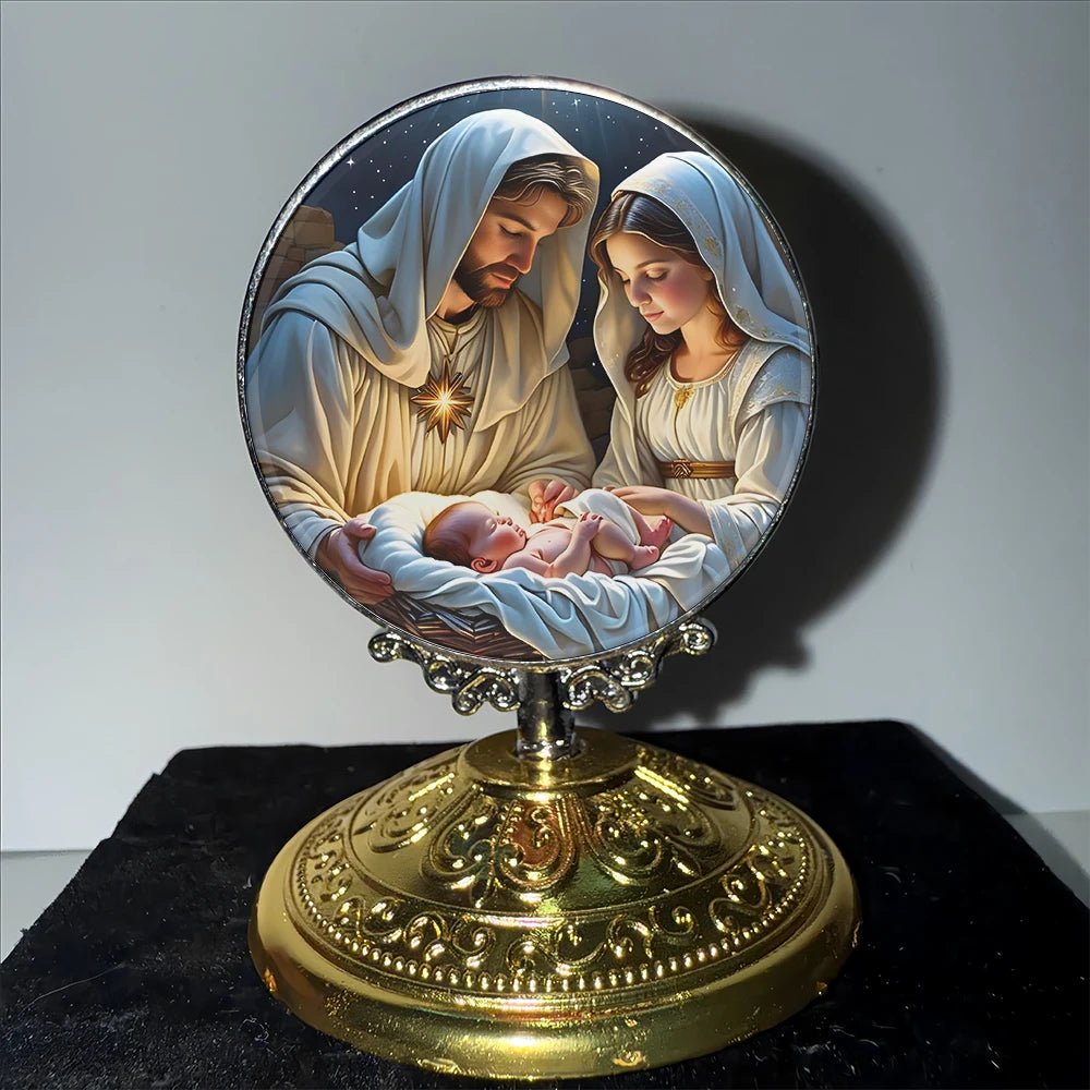 A framed religious image depicting the Holy Family with the infant Jesus and Mary.