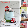 A birthday cake decorated with farm animal toppers including a cow, duck, and penguin.