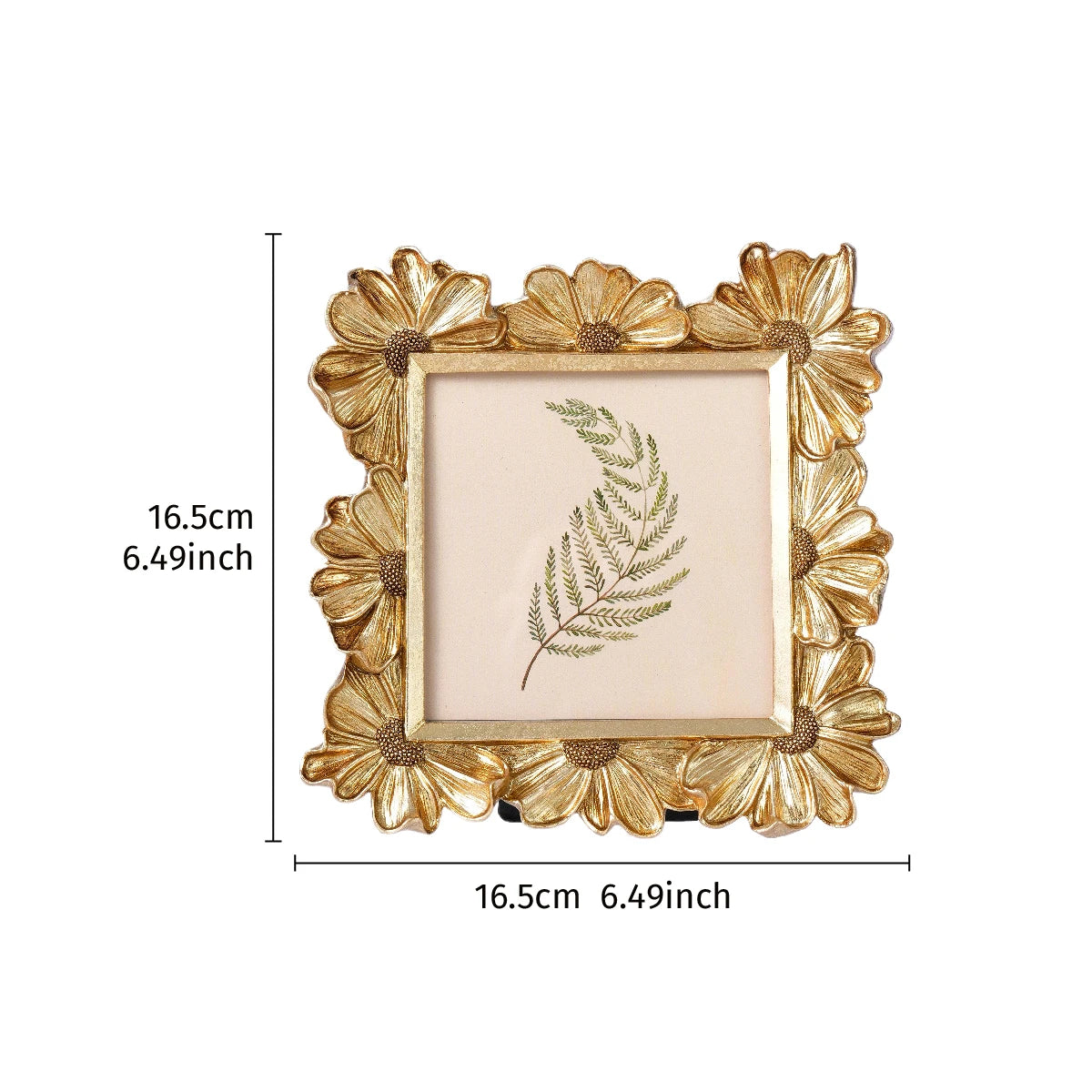 Golden 3D daisy resin photo frame with a floral border and a sprig of greenery inside