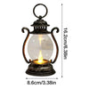 A vintage style battery-powered desk lamp with a dark metal finish and an exposed light bulb.