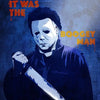 A stylized illustration of Michael Myers from the horror movie 'Halloween' with a knife, set against a dark blue background.