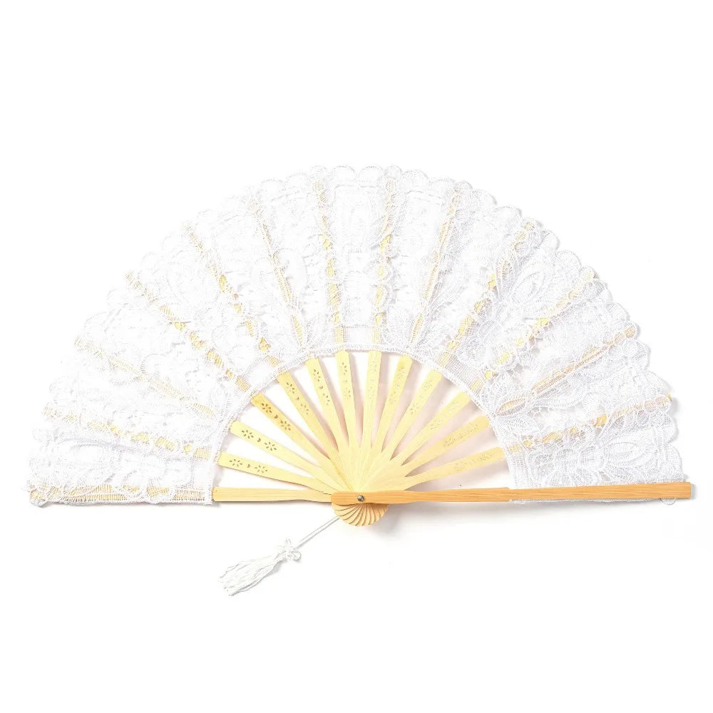 White vintage lace hand fan with a gold sunburst design and a tassel pendant