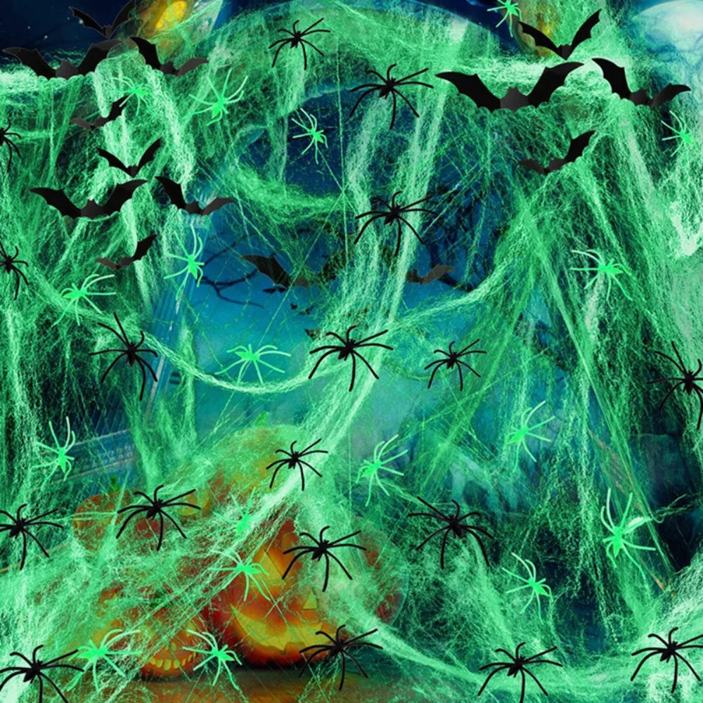 A vibrant green glow-in-the-dark spider web decorated with numerous fake black spiders against a dark blue background.