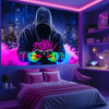 A person wearing a hoodie is featured prominently on a wall with neon purple and pink lighting, set against a cityscape backg