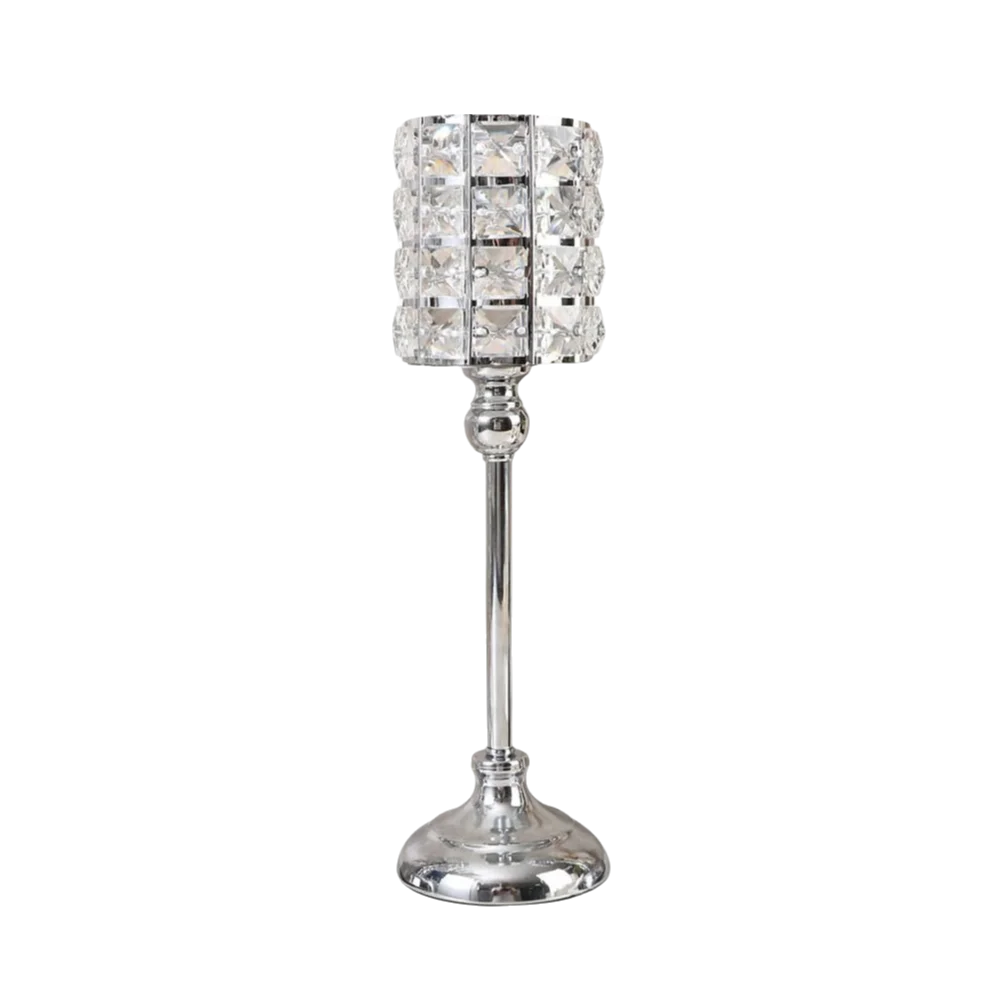 Porta velas de cristal transparente con cuenco texturizado facetado y tallo esbelto.